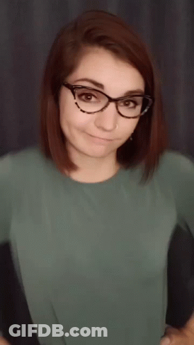 Woman Wearing Glasses Making Funny Face GIF