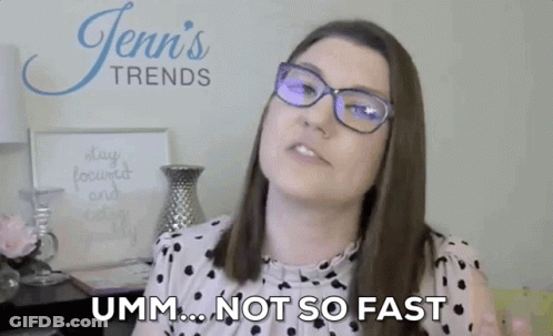 Woman Wearing Glasses Making Funny Face Saying Not So Fast GIF