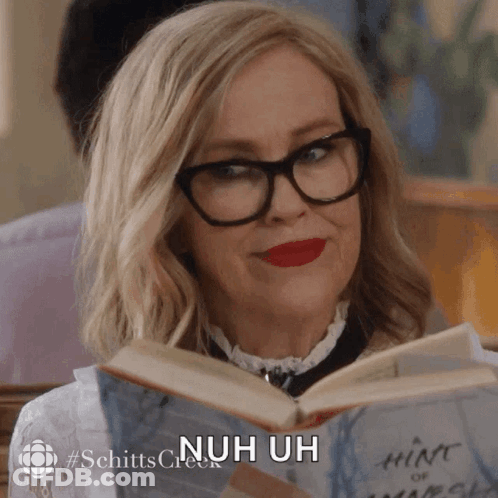 Woman Wearing Glasses Reading Book Nuh Uh GIF