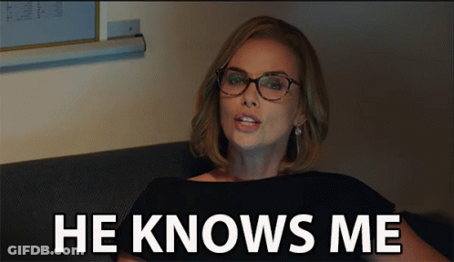 Woman Wearing Glasses Sitting On Couch GIF