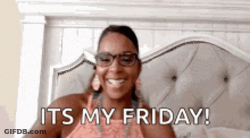Woman Wearing Glasses Smiling In Bed GIF