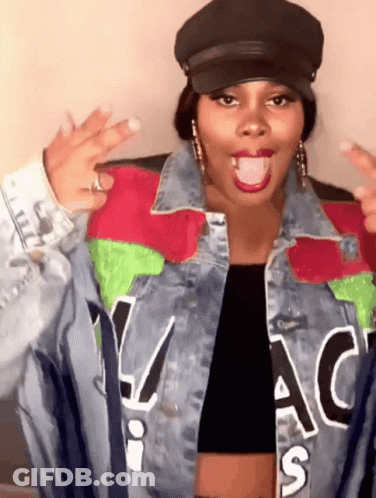 Woman Wearing Hat And Denim Jacket GIF