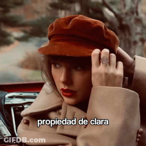 Woman Wearing Hat And Ring Saying Propiedad De Clara GIF