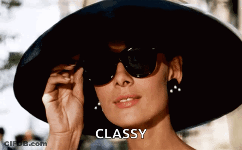 Woman Wearing Hat And Sunglasses With Classy Text GIF
