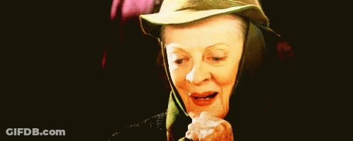 Woman Wearing Hat Holding Paper GIF