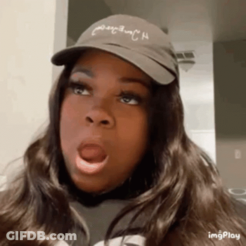 Woman Wearing Hat Making Funny Face GIF