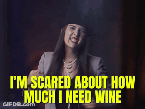 Woman Wearing Hat Saying I'm Scared About Wine GIF