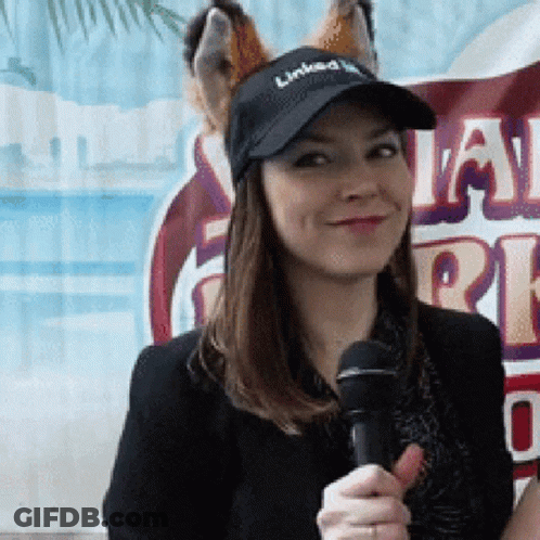 Woman Wearing Hat Saying Linked GIF
