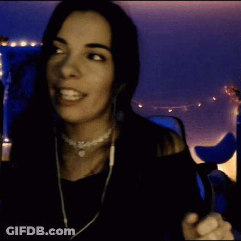 Woman Wearing Headphones And Choker Smiling GIF