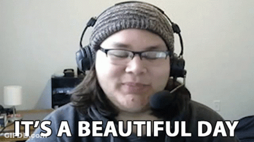 Woman Wearing Headphones And Glasses Says It's A Beautiful Day GIF