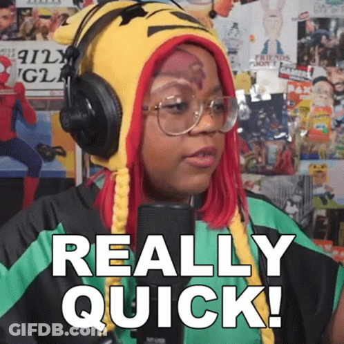 Woman Wearing Headphones And Hat Says Really Quick GIF