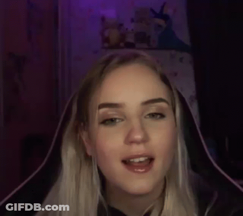 Woman Wearing Headphones And Hood GIF