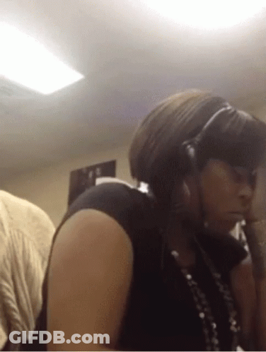 Woman Wearing Headphones And Necklace GIF