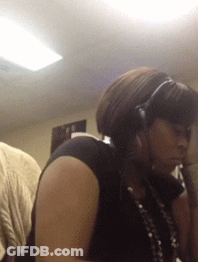 Woman Wearing Headphones And Necklace GIF