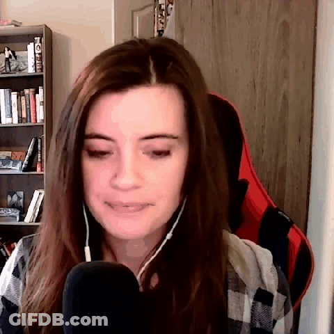 Woman Wearing Headphones And Plaid Shirt At Microphone GIF