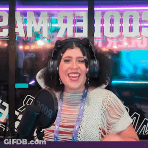 Woman Wearing Headphones At Microphone GIF