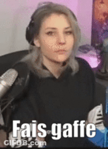 Woman Wearing Headphones At Microphone Saying Fais Gaffe GIF