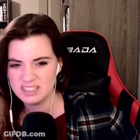 Woman Wearing Headphones In Gaming Chair GIF