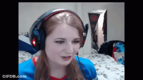 Woman Wearing Headphones Making Funny Face GIF