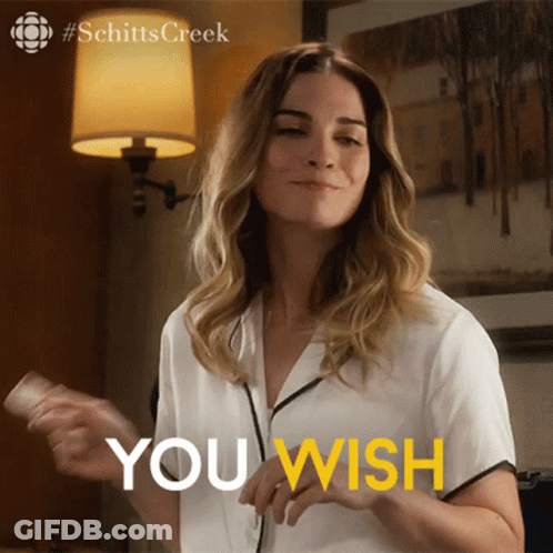 Woman Wearing Headphones Making Funny Face GIF