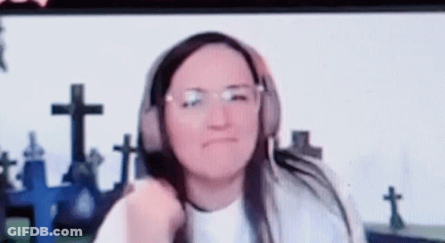 Woman Wearing Headphones Making Funny Face GIF