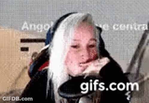 Woman Wearing Headphones Making Funny Face GIF