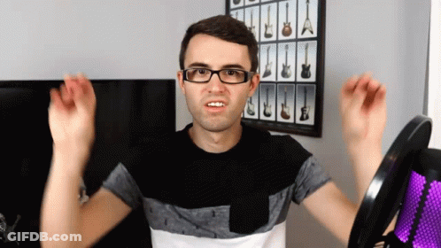 Woman Wearing Headphones Making Funny Face GIF