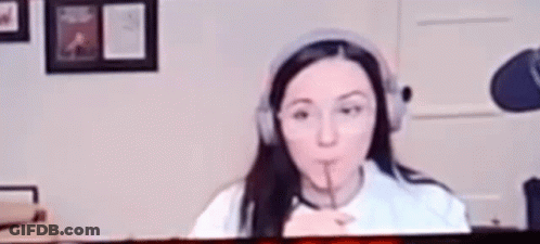 Woman Wearing Headphones Making Funny Face GIF