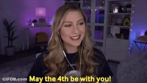 Woman Wearing Headphones Saying May The 4Th Be With You GIF