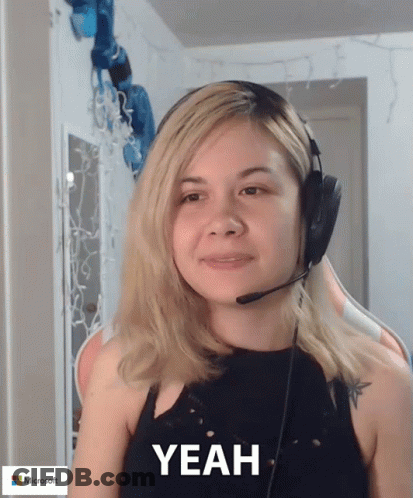 Woman Wearing Headphones Saying Yeah GIF