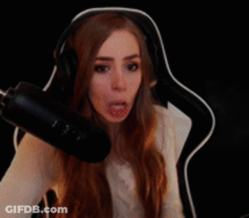 Woman Wearing Headphones Sitting In Front Of Microphone GIF