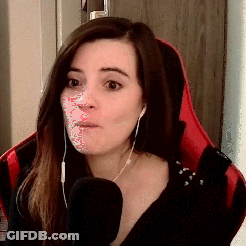 Woman Wearing Headphones Sitting In Red Chair GIF