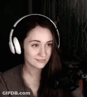 Woman Wearing Headphones Smiling At Microphone GIF