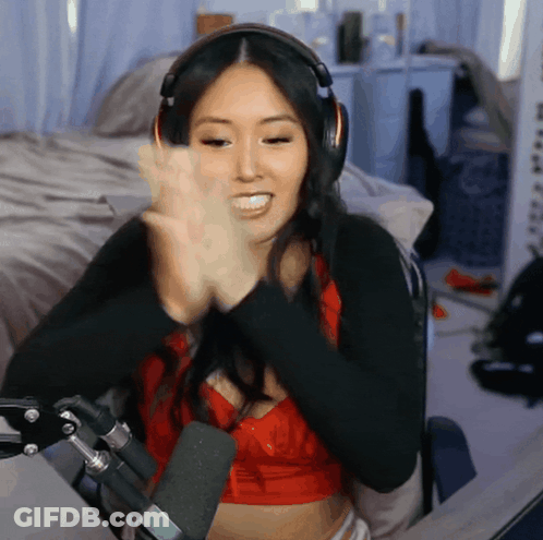 Woman Wearing Headphones Smiling GIF