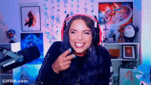 Woman Wearing Headphones Smiling In Front Of Shure Microphone GIF