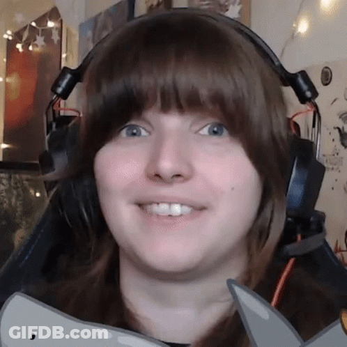 Woman Wearing Headphones Smiling GIF