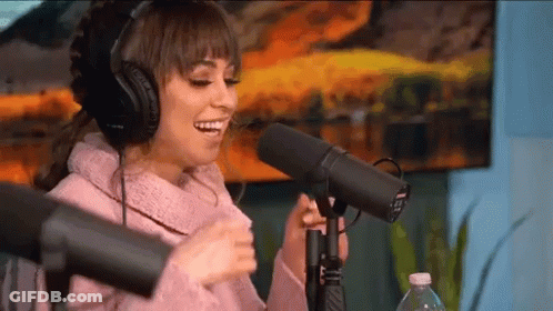 Woman Wearing Headphones Speaking Into Microphone GIF