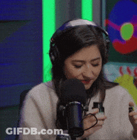Woman Wearing Headphones Talking Into Microphone GIF