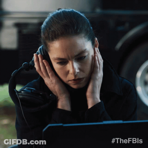 Woman Wearing Headphones Using Laptop GIF