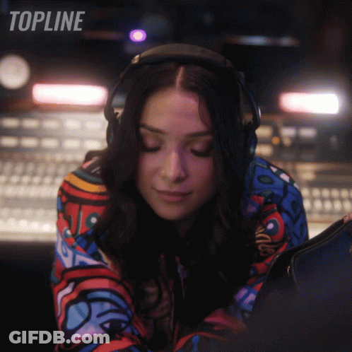 Woman Wearing Headphones GIF
