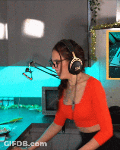 Woman Wearing Headphones With X GIF