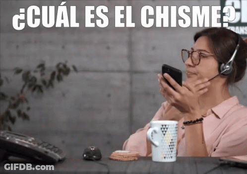 Woman Wearing Headset Looking At Phone Cual Es El Chisme GIF