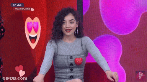Woman Wearing Heart Sweater With Karol GIF