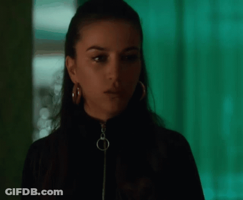 Woman Wearing Hoop Earrings GIF