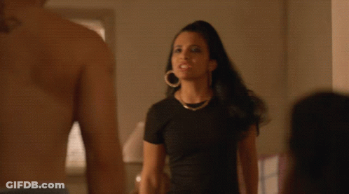 Woman Wearing Hoop Earrings GIF