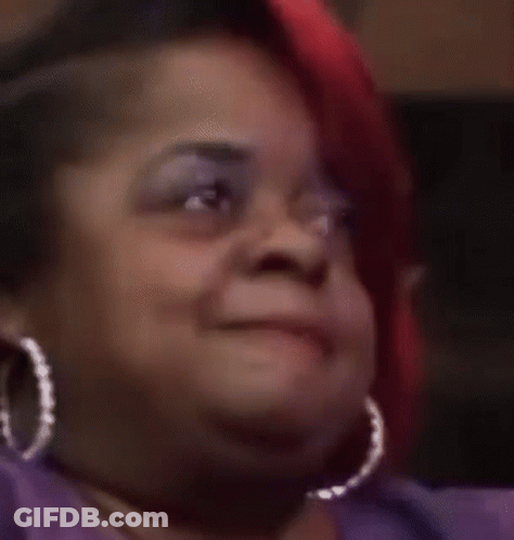 Woman Wearing Hoop Earrings Making Funny Face GIF
