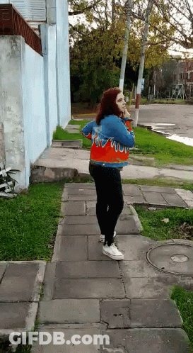 Woman Wearing Jacket Saying Flame GIF