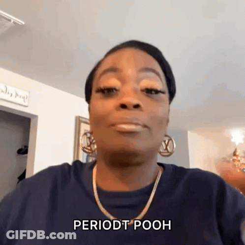 Woman Wearing Necklace And Earrings Making Funny Face GIF