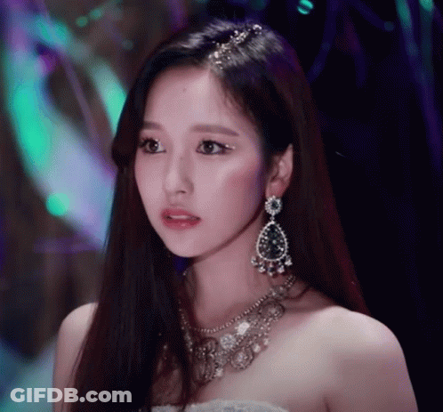 Woman Wearing Necklace And Earrings GIF