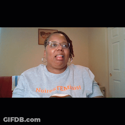 Woman Wearing Noire Feminist Shirt GIF